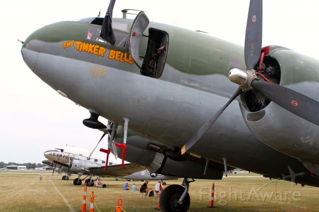 CURTISS Commando (N78774) - C46 Tinker Belle standing on the flight line at Airventure 2012