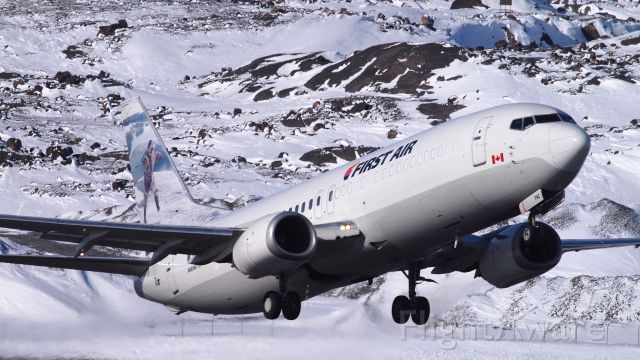 BOEING 737-400 (C-FFNC) - Hop on board! A First Air flight taking off from the Iqaluit airport.