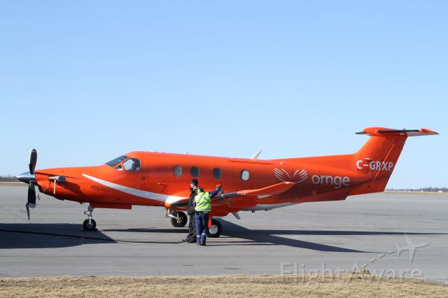 Pilatus PC-12 (C-GRXP) - Falsely labelled above, the aircraft is an air ambulance version of the Pilatus PC12 seen at Kingston, Ontario (CYGK) on March 5th, 2012