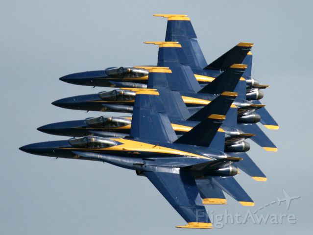 — — - Spectacular formation of the Blue Angels