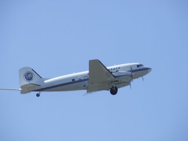 Douglas DC-3 (C-FTGI) - Taking off enroute to system calibration flight. 27 April 2010.