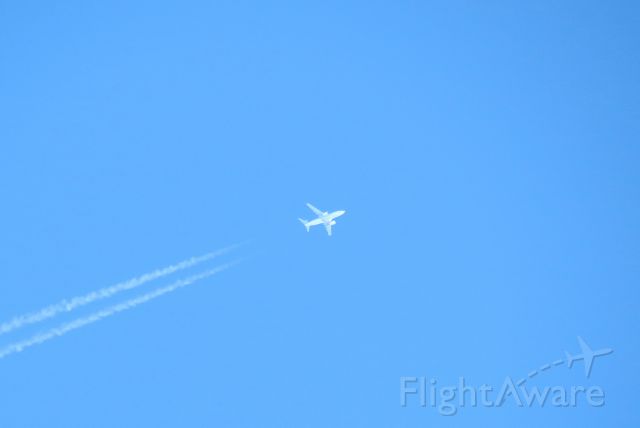 Boeing 737-700 (C-FUWS) - Flying over San Diego en route to Puerto Vallarta from somewhere in Canada.