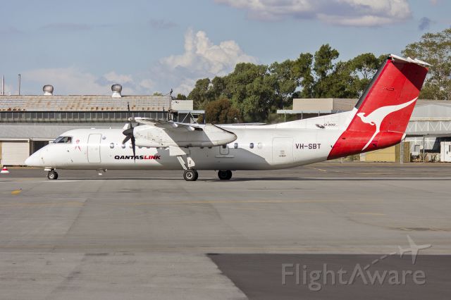 de Havilland Dash 8-300 (VH-SBT) - QantasLink (VH-SBT) Bombardier Dash 8 Q300 on the tarmac at Wagga Wagga Airport.
