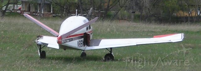Beechcraft 35 Bonanza (N8SM) - Aircraft in the field the day following the accident.