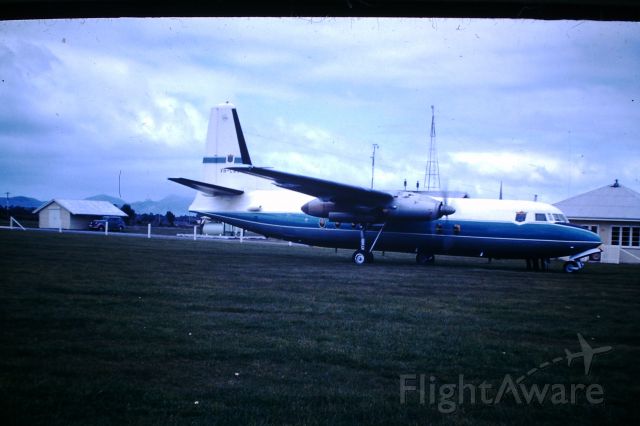 FAIRCHILD HILLER FH-227 (VH-CAV) - DCA F27 parked on the grass in front of the Flight service Unit circa 1963 From my fathers collection