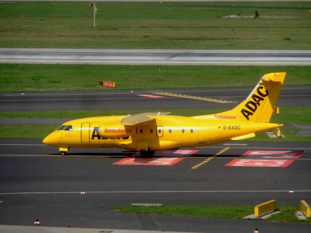 Fairchild Dornier 328 (D-BADC) - An ADAC Dornier Do-328JET-310 with the Reg D-BADC taxiing after landing to the DUS terminal. Seen at 29th august 2015. Best wishes to the poor guy whose holiday is over unplanned.