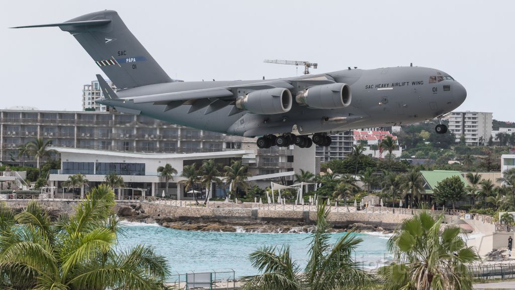 Boeing Globemaster III (08-0001) - Multi National Air force 08-0001 SAC heavy airlift wing C17 over maho beach for landing with supplies for the fight against COVID19 from Holland for the Islands.br /SAC01 on her first ever visit to the Caribbean.