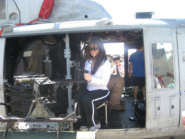 Bell UH-1V Iroquois — - Armine posing on a UH-1 at the Joint Services Open House 2011 held on Andrews Air Force Base.