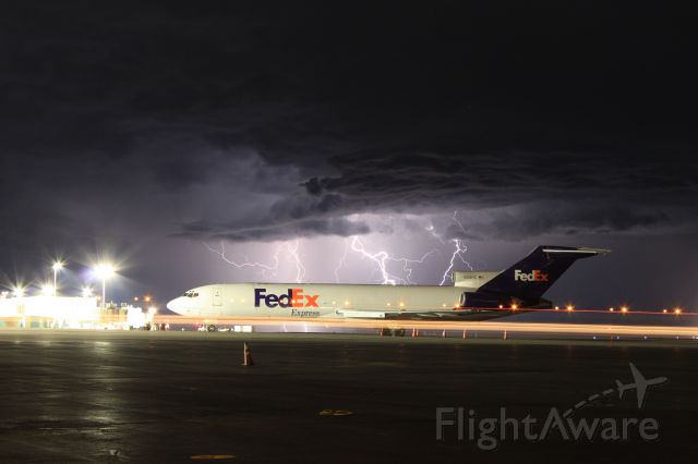 BOEING 727-200 (N216FE) - Thunderstorm moving northeast just close enough to give us awesome lightning without the rain. We could barely hear the rumbles and could see the sheets of rain as it moved past. Very cool night.