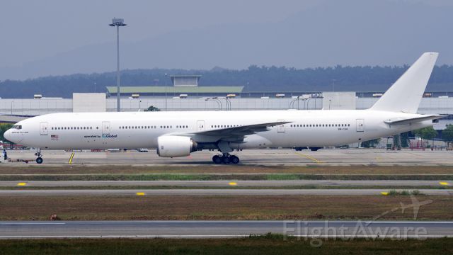 BOEING 777-300 (9M-FSM) - flyGlobal, a Malaysian ACMI charter carrier has just added this ex-Emirates B777-300 to their fleet.
