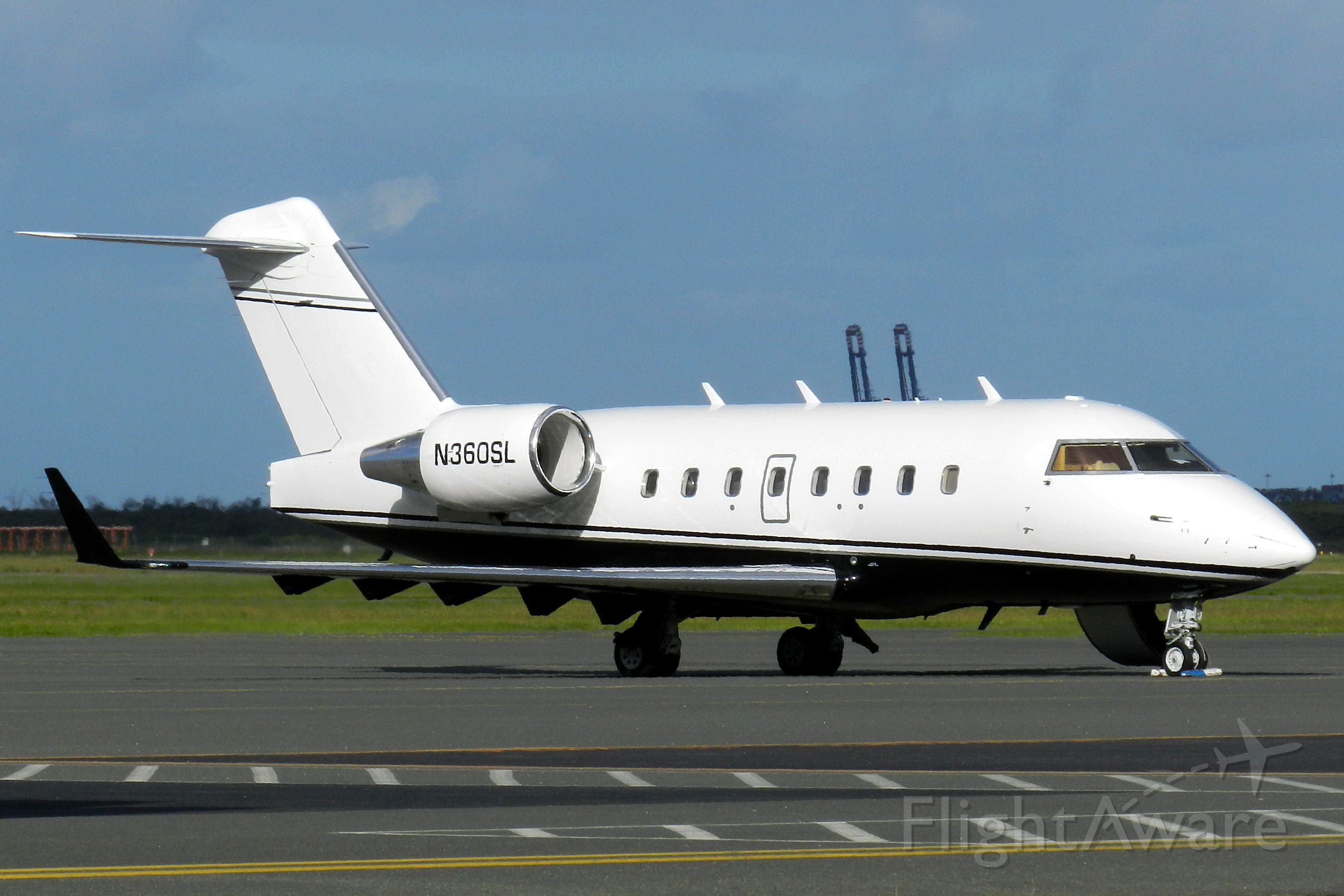 BOMBARDIER Regional Jet CRJ-1000 (N360SL) - CL-600-2B16 Challenger 601-3A N360SL at Brisbane International Airport 30 Jan 2014