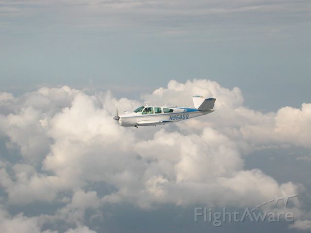 Beechcraft 35 Bonanza (N9585Q) - near St Maarten in formation with N1590L