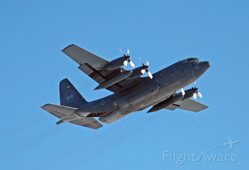 Lockheed C-130 Hercules (13-0335) - 1985 Lockheed CC-130H Hercules (130335) doing a low pass prior to dropping a SAR Tech on Feb 26, 2021