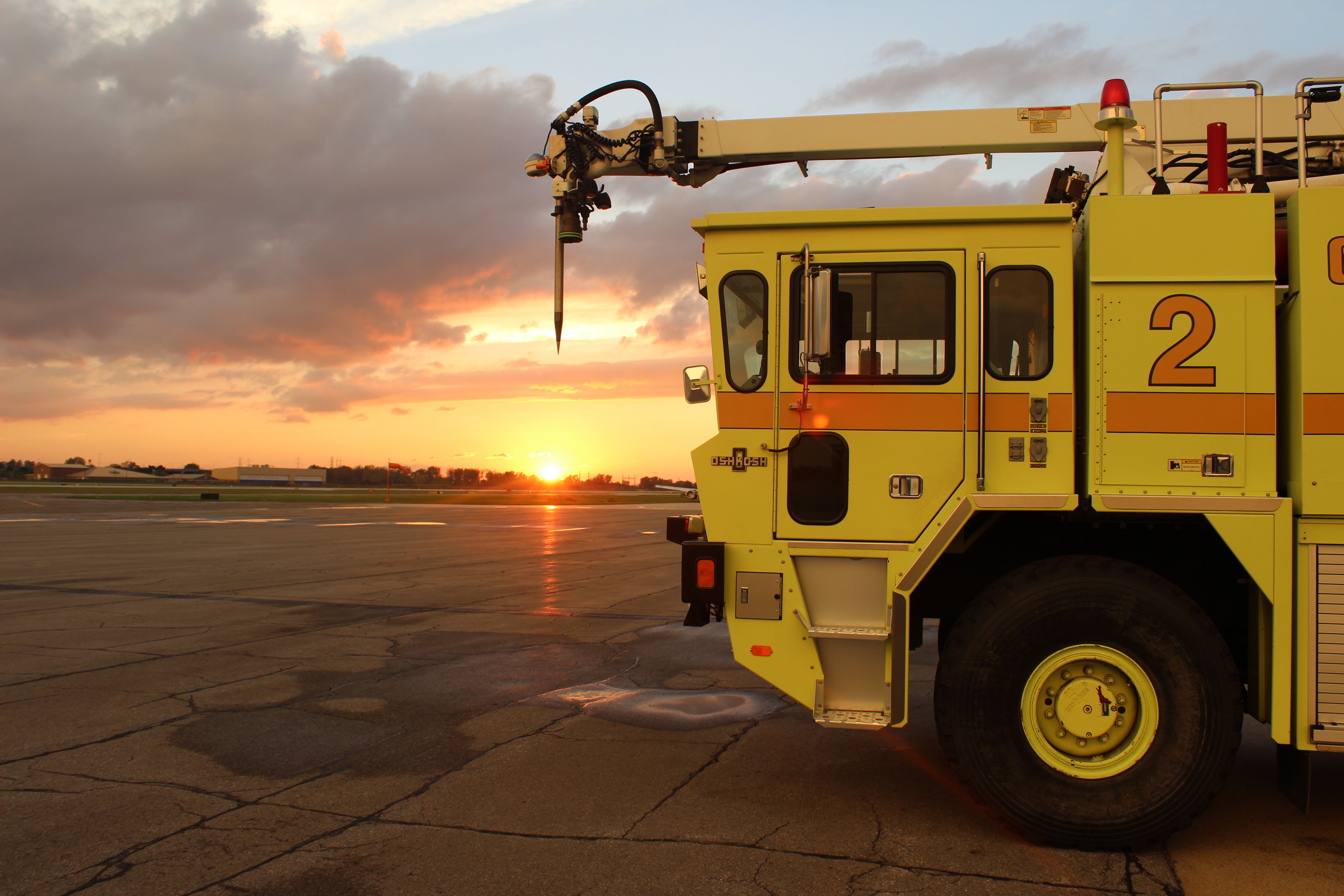 — — - Rescue 2 sitting in front of ARFF Station 14 Gary Regional Airport. 