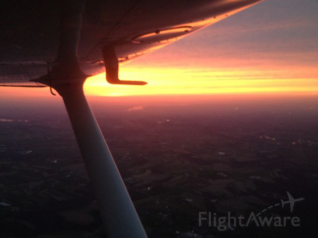 Cessna Skyhawk (N7565D) - Sunset, last leg of trip from Ft Myers FL to Reading PA. April 18, 2014