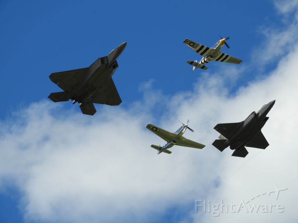 — — - Heritage flight over Orange County with 2 P51 Mustangs, 1 F22 Raptor, and 1 F35 Lightning II. 