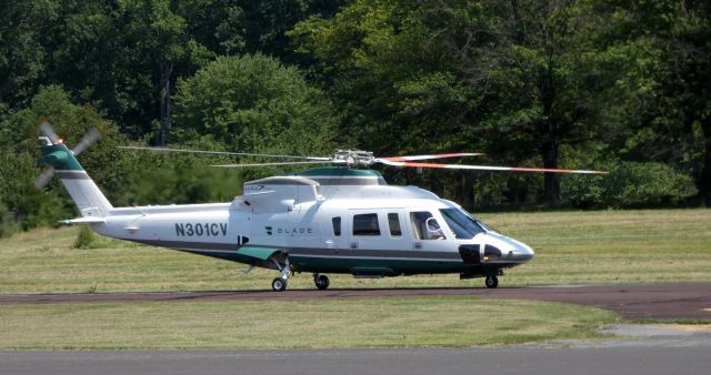 Sikorsky S-76 (N301CV) - On the active runway is this 2007 Sikorsky S-76C Rotorcraft in the Summer of 2019.