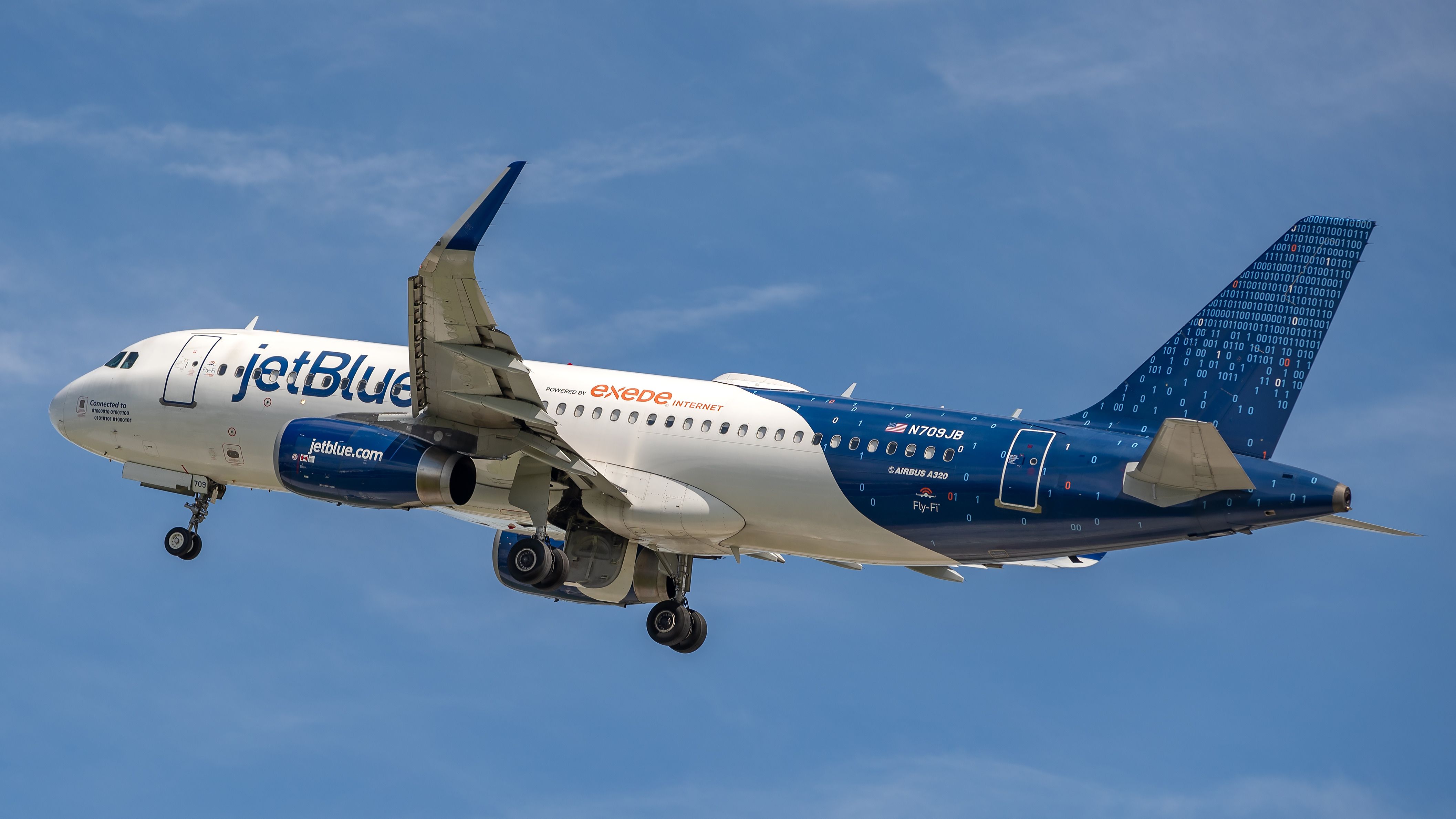 Airbus A320 (N709JB) - Jetblue A320 Binary livery taking off from runway 28L at KFLL