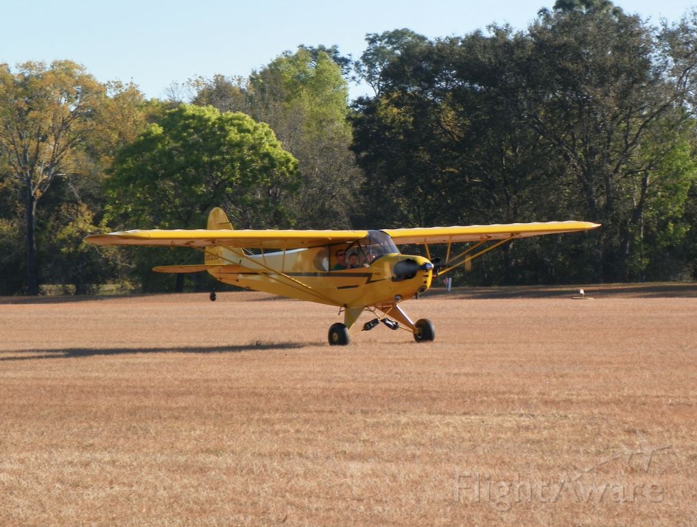 Piper L-21 Super Cub — - Fly In on 3/17/18. A couple kids go for a spin around the patch