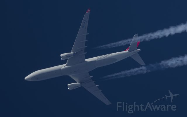Airbus A330-300 (TC-JNJ) - 7-4-2014. Turkish Airlines Airbus A330 TC-JNJ passes overhead West Lancashire ,England,UK at 36,000ft working route Istanbul-Montreal THY35.br /Pentax K-5.