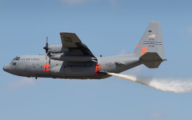 Lockheed C-130 Hercules (94-7310) - An Air Force MAFFS (Modular Airborne FireFighting System) equipped C-130 flying by at EAA Airventure 2019.