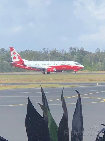 Boeing 737-700 (N127CG) - NSW rural fire service takes off from Coffs Harbour to the fire grounds. It can deliver 15000 liters of suppressant and caries 70 fire fighters