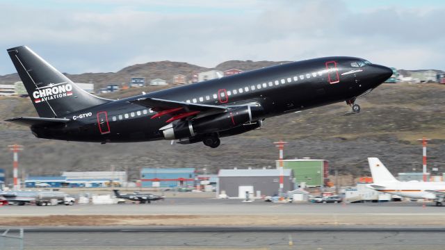 Boeing 737-200 (C-GTVO) - "MatBlack", which is matte black. Chrono Aviation C-GTVO a Boeing 737-200. leaving Iqaluit on August 15, 2019  It appears to have a skid plate on its front wheels, for landing at Mary River, Nunavut