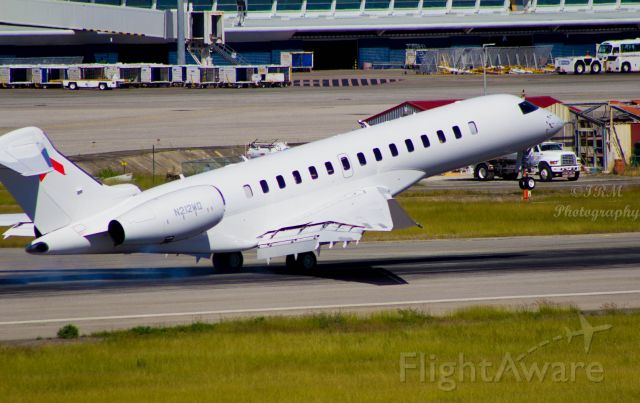 BOMBARDIER BD-700 Global 7500 (N212WQ) - Global 7500 touching down. Love the nose attitude.