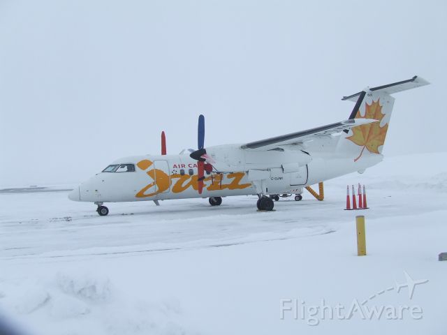 de Havilland Dash 8-400 (C-GJMI) - waiting in the frozen north,Ottawa,Ontario,Canada