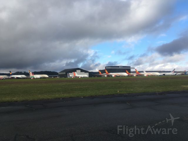 — — - sad panorama of beautiful aeroplanes waiting to be reduced to spare parts