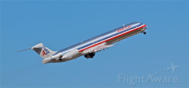 McDonnell Douglas MD-80 — - American departing runway 12R.