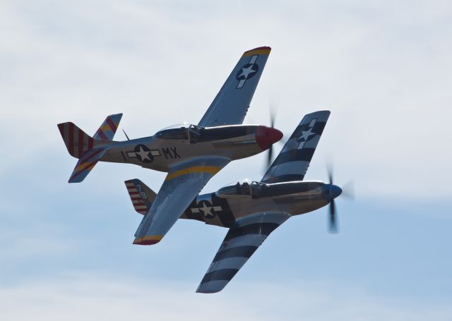 — — - Alliance Airshow 2010, two Mustangs do a flyover.