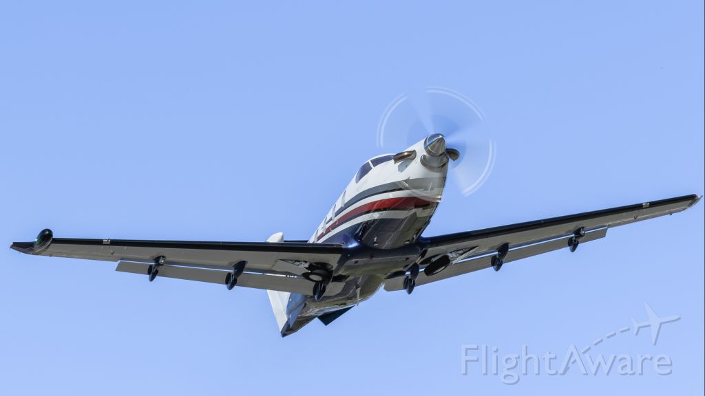 Pilatus PC-12 (N859PL) - Pilatus N859PL seen climbing out after takeoff from St Maarten.