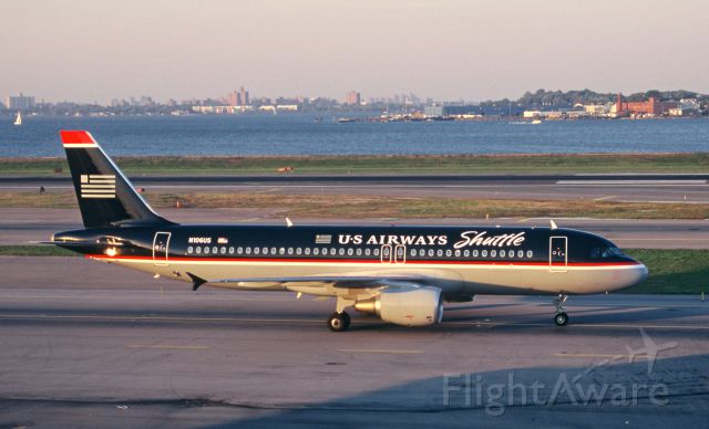 Airbus A320 (N106US) - US Airways most famous A-320 N106US heads to the gate in LGA on a Beautiful fall evening in October 1999 just 2 months after the Airbus was delivered to US.