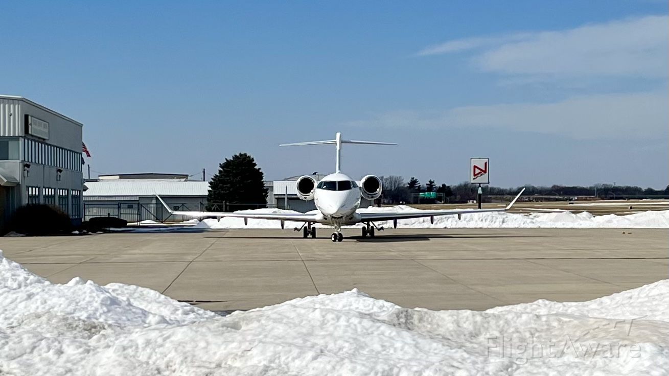 Canadair Challenger 350 (N780QS) - Face to face with N780QS, a 2015 Bombardier Challenger 350. 2/21/22. 