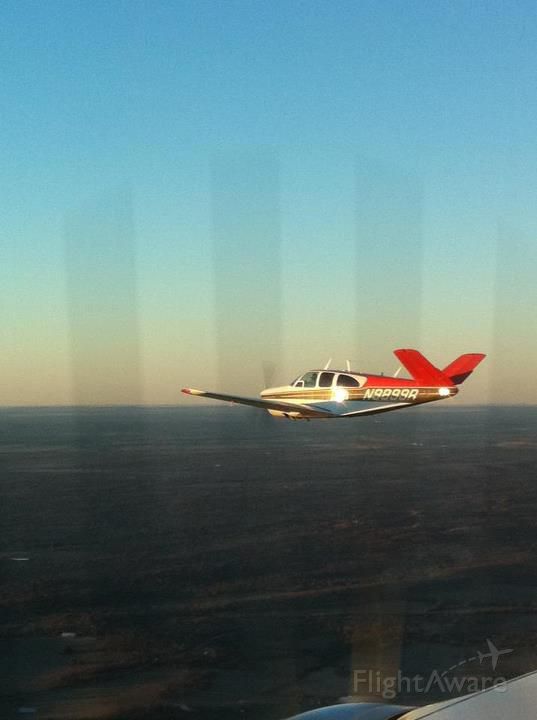 Beechcraft 35 Bonanza (N9899R) - I was flying 9899R and my Cousin snapped this picture from his Baron