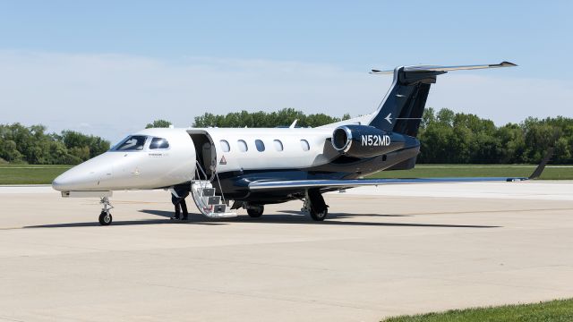 Embraer Phenom 300 (N52MD) - A Phenom 300 for Nicholas Air sits on the ramp at KPPO.