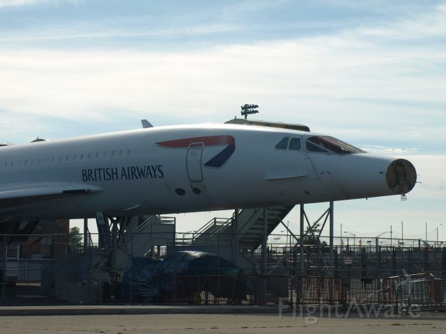 Aerospatiale Concorde (G-BOAD) - C-BOAD was temporarily moved to Floyd Bennett Field in Brooklyn while the Intrepid aircraft craft carrier underwent restoration, I took this photo in 2008 not long after a truck had hit the the nose which was in the down position 