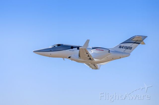 Honda HondaJet (N419DB) - So excited to have captured this Honda Jet! First time I have even saw one other than in magazines. Smaller than I thought and it seemed very quick and it was pretty darn quiet. Not sure what advantages there are by putting the engines on the wings, but the whole jet is very sexy!