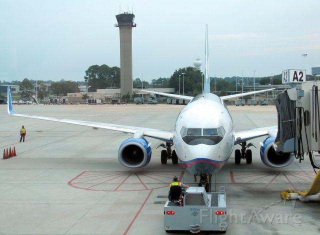 Boeing 737-700 (N289AT) - An Air Tran 737-700 pushing back from Jacksonville Internationals gate A2.