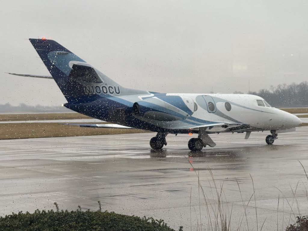 Dassault Falcon 10 (N100CU) - Chilly Rainy day at Porter County Regional Airport 