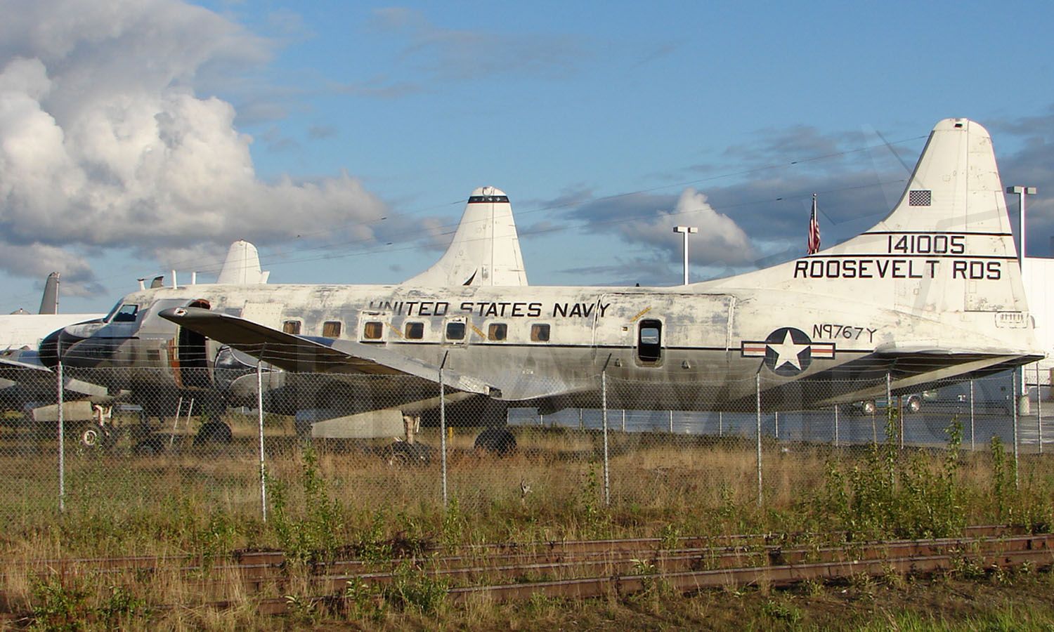 N9767Y — - Convair C-131F sits in Everts Fuel compound at Fairbanks - showing signs of it former life with US navy