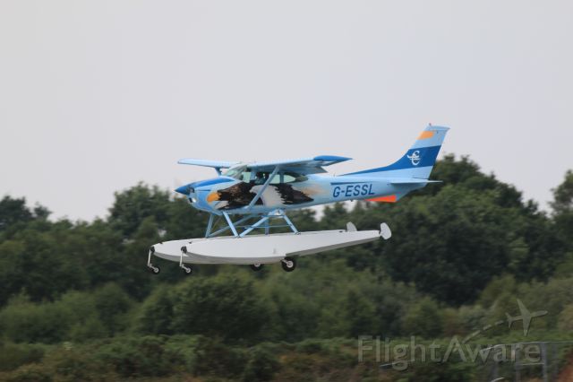 Cessna Skylane (G-ESSL) - View from the Blackbushe Cafe ....back from splashing in the Solent 