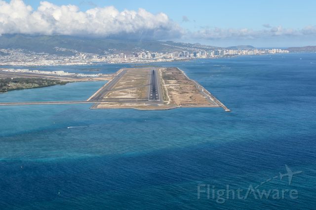— — - Approaching the 12,000' Runway 8R / 26L at Honolulu Hawaii's HNL airport with Waikiki beach in the background. Questions about this photo can be sent to Info@FlewShots.com
