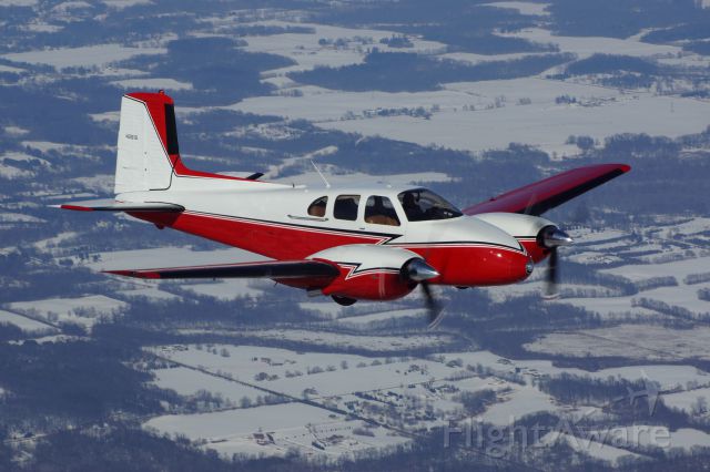 Beechcraft Twin Bonanza (N261B) - Over Northern Indiana. 
