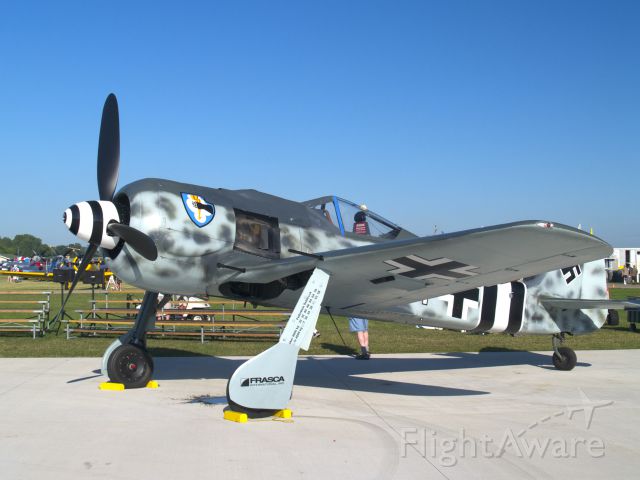 FLUG WERK Fw-190 Replica (N190RF) - This Flug Werk replica of a Focke-Wulf 190 completed by Rudy Frasca comes as a kit from the factory in Gammelsdorf, Germany.  An original Focke-Wulf tailwheel is included...  Seen in the warbird arena at Airventure 2011
