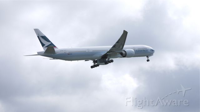BOEING 777-300 (B-KQA) - BOE238 (LN:1008) flies a missed approach over runway 16R during its maiden flight test on 4/6/12.