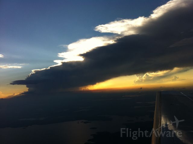 Piper Malibu Mirage (N9131X) - T-Storms in Canada close to sunset