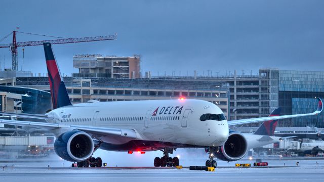 Airbus A350-900 (N506DN) - Delta A350 taxing into a snowy MSP from Seoul.