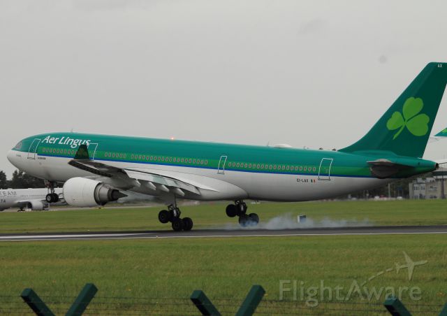 Airbus A330-200 (EI-LAX) - EI-LAX Airbus A330-202  CN269 Aer Lingus  Dublin 010916. Smoking up the tyres after a transatlantic flight
